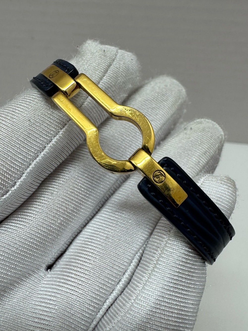 Louis Vuitton Epi leather bracelet with a gold-tone keyhole charm